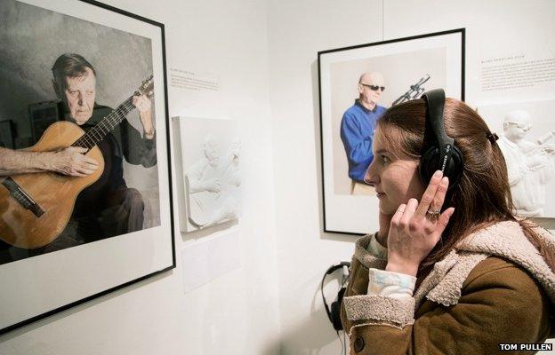 Woman listening to audio track
