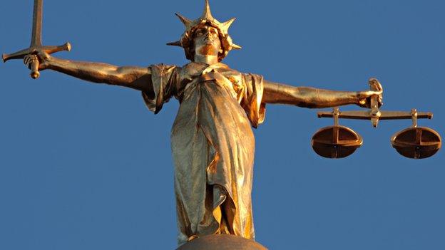 The figure of Lady Justice, at the top of the dome of the Old Bailey in London