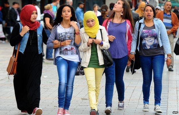 Tunisians walking in central Tunis, Tunisia - November 2013