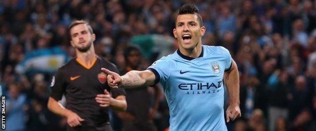 Sergio Aguero celebrates after putting Manchester City ahead from the penalty spot