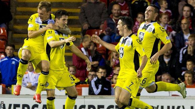 Kenny McLean takes the plaudits from his St Mirren team-mates after netting the late leveller