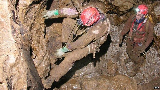 Handout photo released by Espeleo Club Andino del Perú, showing the rescue effort for the Spanish speleologist Cecilio López Tercero, on, 25 September 2014