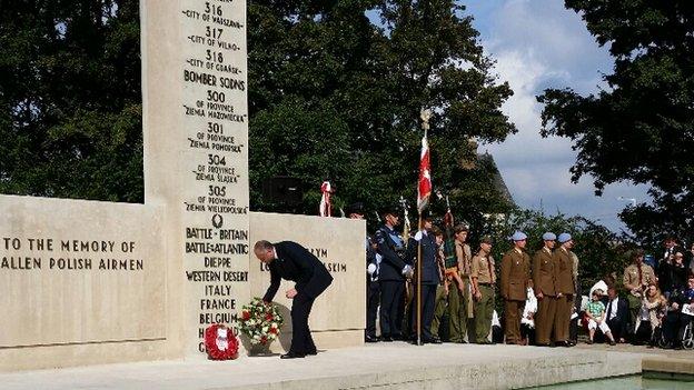 The Polish ambassador Witold Sobkow lays a wreath at the Polish War Memorial near RAF Northolt