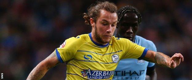 Stevie May in action for Sheffield Wednesday against Manchester City