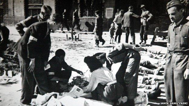 Bodies lined up in the streets of Warsaw in 1944