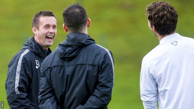 Celtic manager Ronny Deila enjoys a laugh during training