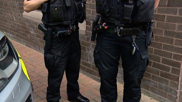 Armed police officers