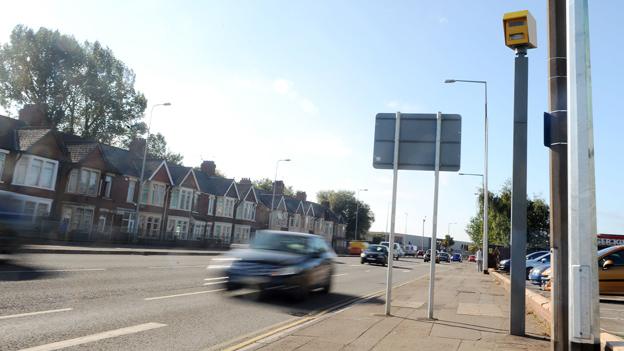 Car passes the speed camera