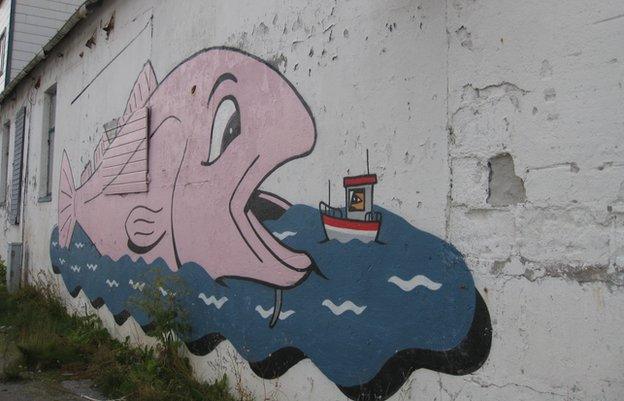 Closed fisheries in Vardoe with commissioned street art