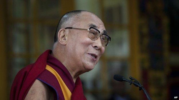 Tibetan spiritual leader the Dalai Lama speaks to a crowd in India on 2 Oct 2014