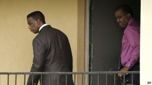 Dallas County Health and Human Services Director Zachary Thompson and Christopher Perkins, D.O., M.P.H. Medical Director, Health Authority with DCHHS walk out of an apartment unit at The Ivy Apartment Complex, Thursday, Oct. 2, 2014, in Dallas