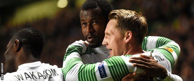 Kris Commons is congratulated on his early goal