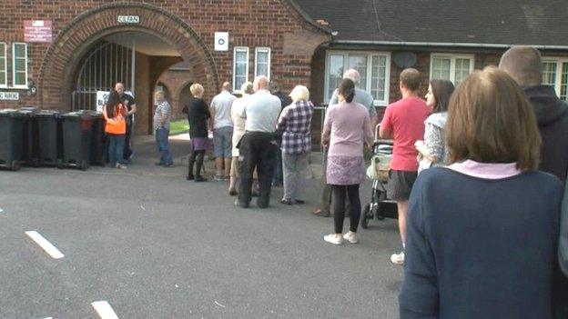 Voters queue at the Flint hospital beds referendum