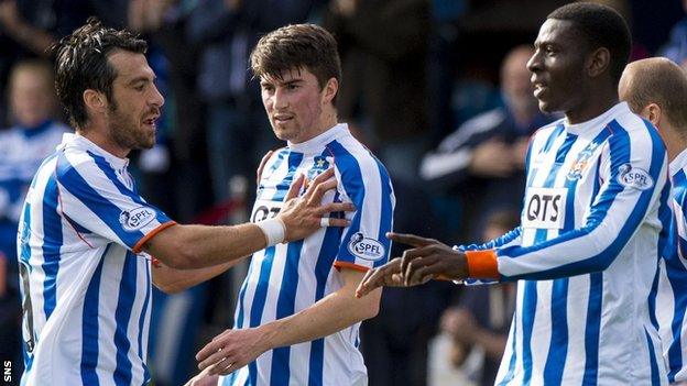 Kilmarnock captain Manuel Pascali (left) congratulates Tope Obadeyi (right)