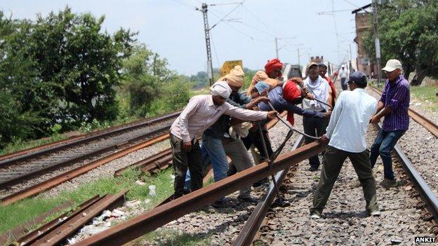 Trackmen are required to replace damaged tracks