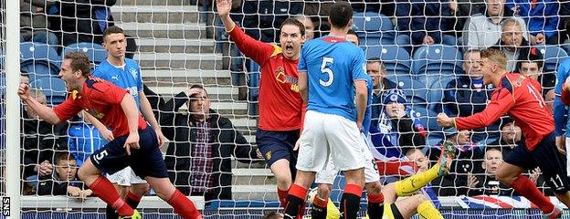 Ciaran Donnelly (left) celebrates after giving Albion Rovers the lead against Rangers at Ibrox in last term's Scottish Cup