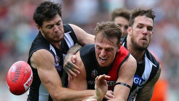 Martin Clarke (left) in action for Collingwood against Essendon last year