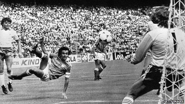 Michel Platini attempts a bicycle kick for France against Northern Ireland in 1982 World Cup