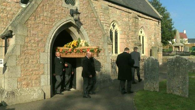 David Miller's wicker coffin was adorned with sunflowers