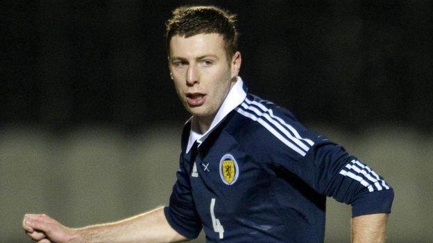 Lewis Toshney in action for Scotland Under-21s