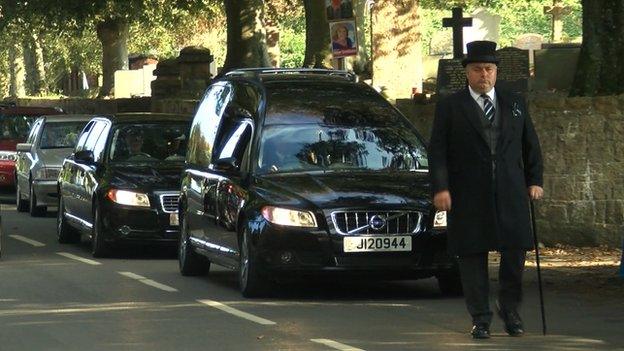 David Miller's funeral cortege outside Trinity church