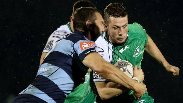 Cardiff's Sam Warburton tackles Connacht's Jack Carty