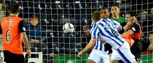 Mark Connolly heads Kilmarnock's second goal