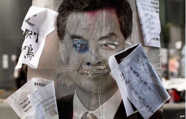 A defaced placard of Hong Kong chief CY Leung near the government's headquarters on 3 October 2014 HQ on 3 October 2014