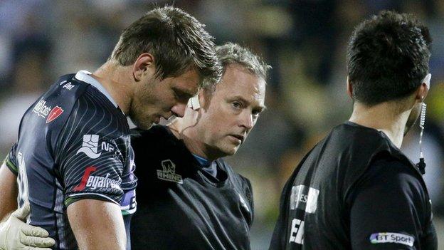 Dan Biggar is helped off in Parma
