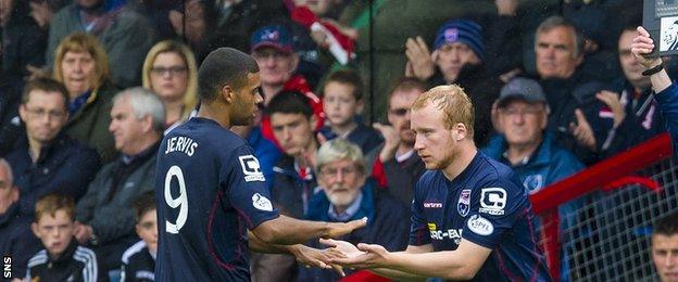 Ross County fans greet their players