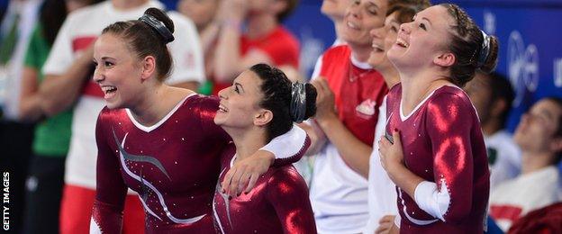 Hannah Whelan, Claudia Fragapane and Ruby Harold celebrate a 1-2-3 finish in the all round competition at the Commonwealth Games