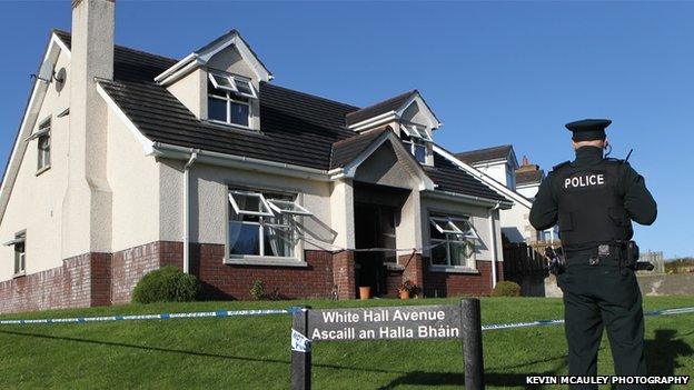 Police at scene of arson attack in White Hall Avenue, Ballycastle,