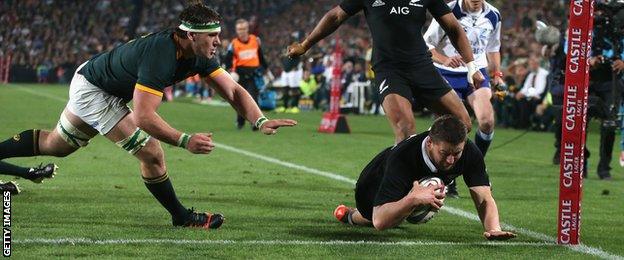 New Zealand's Dane Coles scores against South Africa