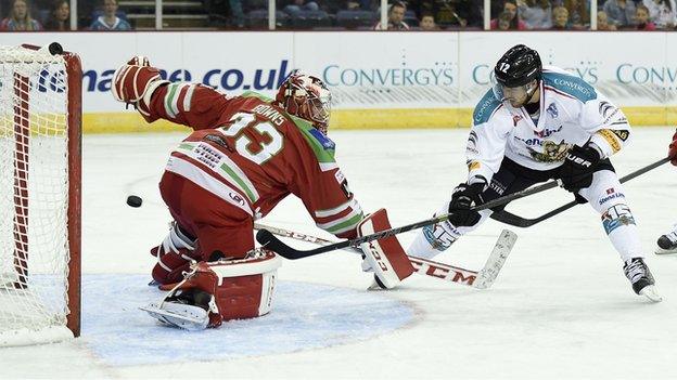 Devils netminder Ben Bowns can't keep out Ray Sawada's shot which put the Giants ahead