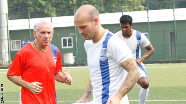 Mumbai City player Freddie Ljungberg (right) with manager Peter Reid