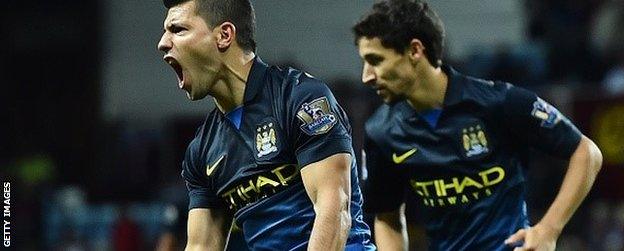 Sergio Aguero celebrates scoring for Man City