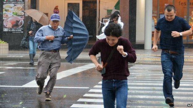 Pedestrians in Myazaki, souther Japan on 5 October 2014