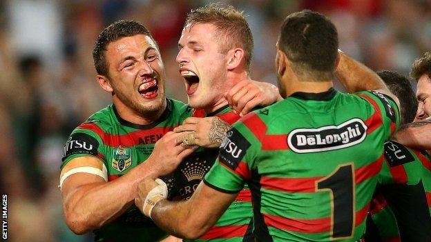 Sam and George Burgess celebrate