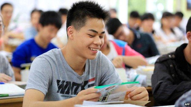 Students in China sit for the 2014 college entrance exam, or the 'gaokao', in Rongan, southwest China's Guangxi province on 7 June, 2014