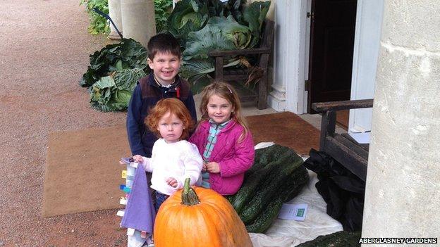 William, Molly and Elizabeth Edwards from Llandeilo with giant vegetables