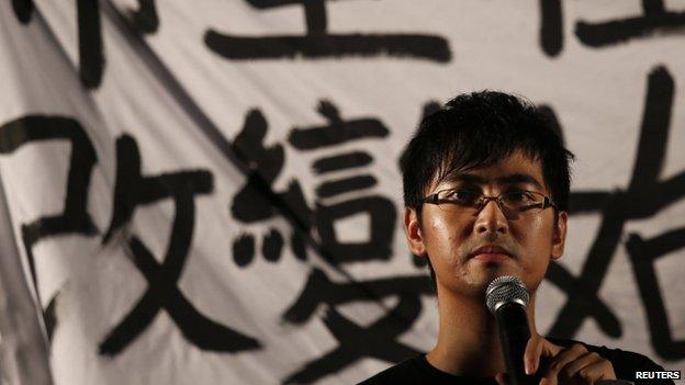 Alex Chow, secretary-general of the Hong Kong Federation of Students, speaks during a campaign to kick off the Occupy Central civil disobedience event in front of the financial Central district in Hong Kong 31 August 2014