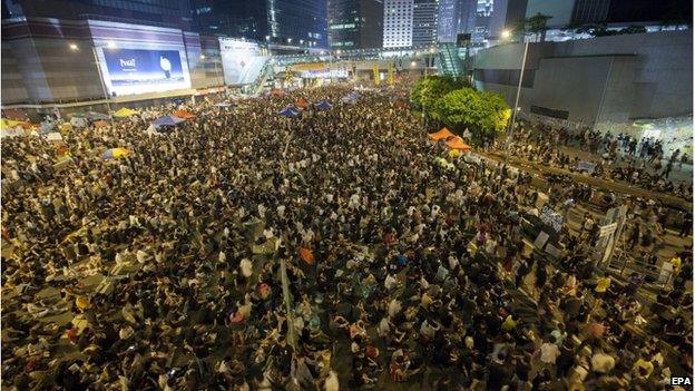 Pro-democracy protesters attend a rally to protest the violence seen in Mong Kok, in Hong Kong, China, \4 October 2014