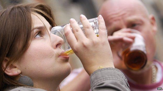 Woman and man drinking