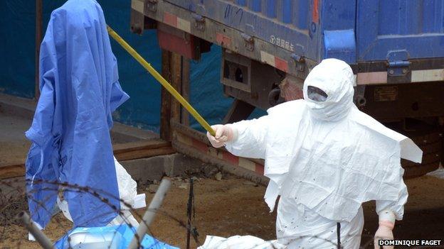 worker in protective clothing