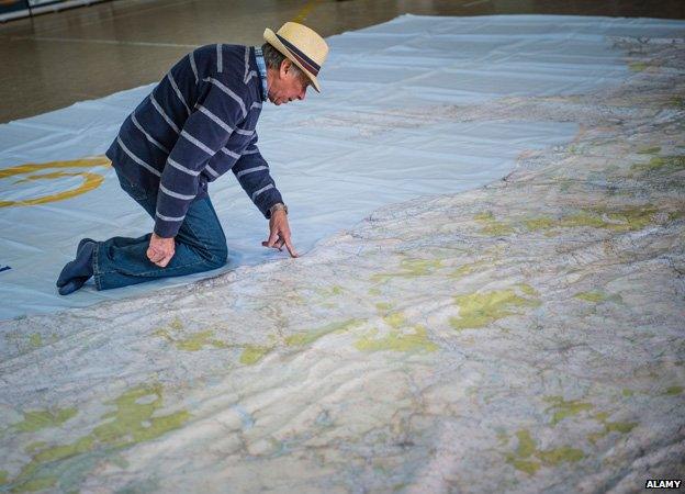 Man on a giant Ordnance map