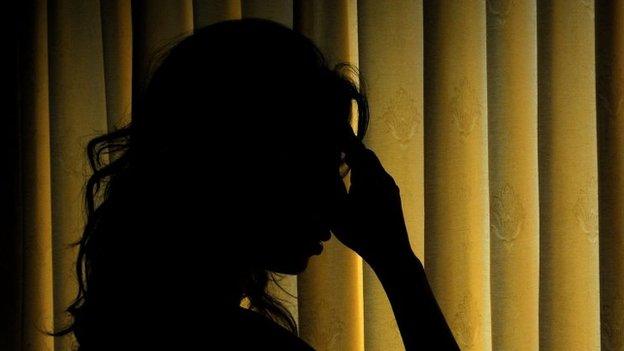 Anguished women in silhouette