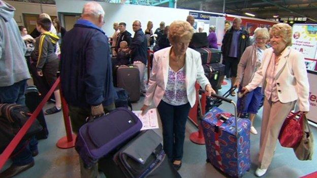 Passengers waiting to check in at Blackpool Airport