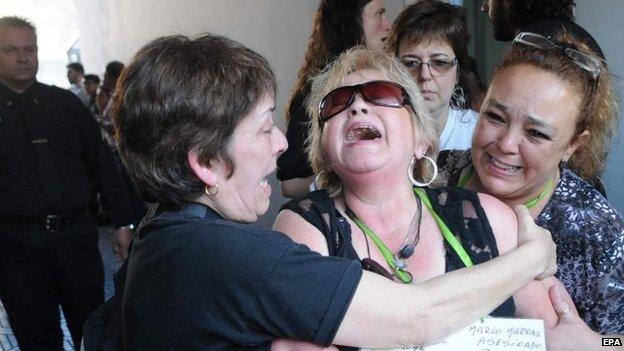 Relatives of victims of forced disappearance during the dictatorship period react after learning of the sentence against former dictator Reynaldo Bignone on 7 October