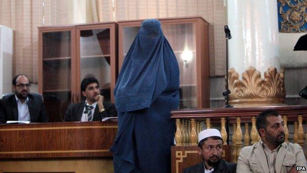 One of four female victims of a gang-rape attends a court hearing in Kabul, Afghanistan, 07 September 2014.