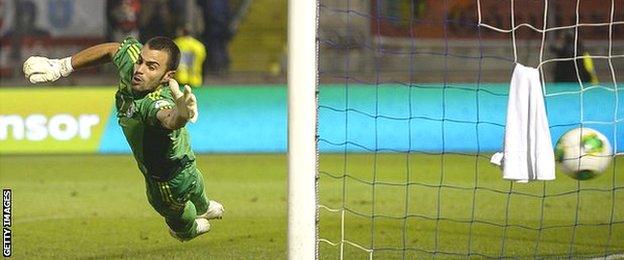 Aldo Simoncini is powerless to prevent another goal flying past him against Poland in a World Cup qualifier in September 2013